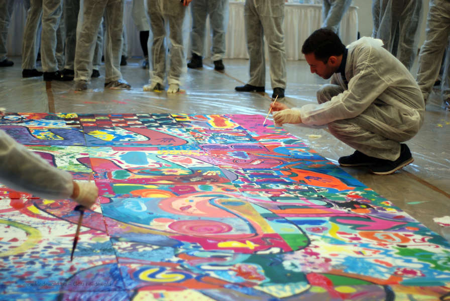 Teambuilding durch Kunst mit Farbe, Energie und gemeinsamer Gestaltung